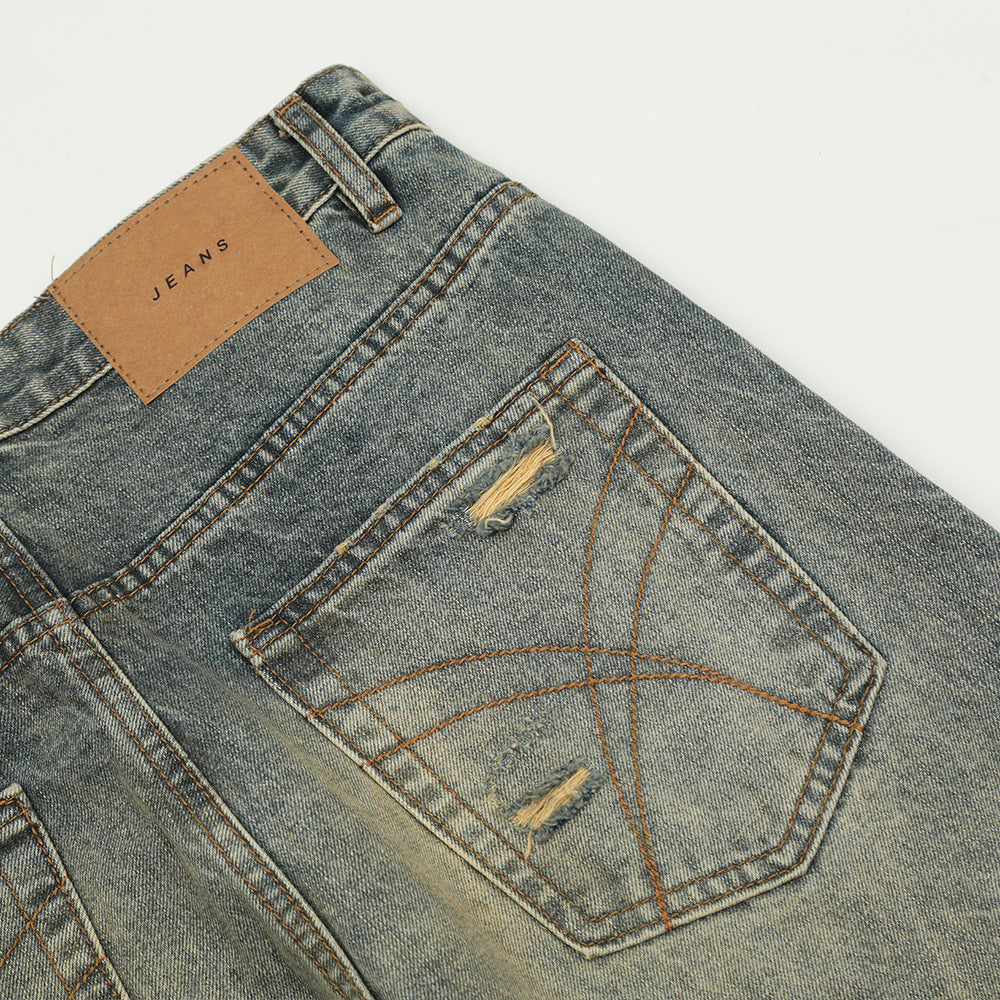 Washed denim straight leg pants with holes