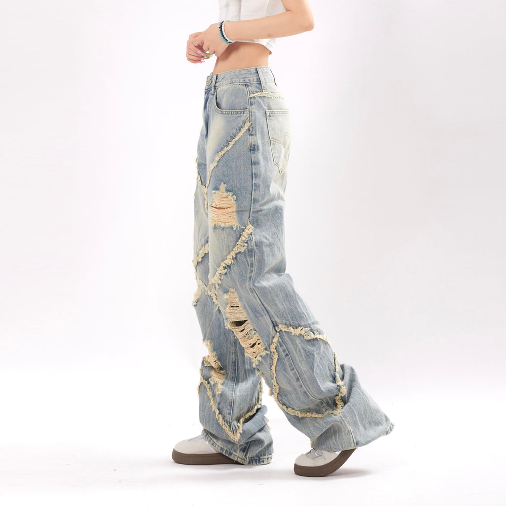 Ripped and frayed denim jeans