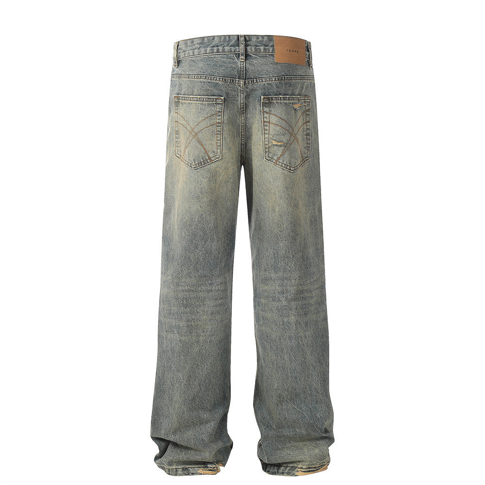 Washed denim straight leg pants with holes
