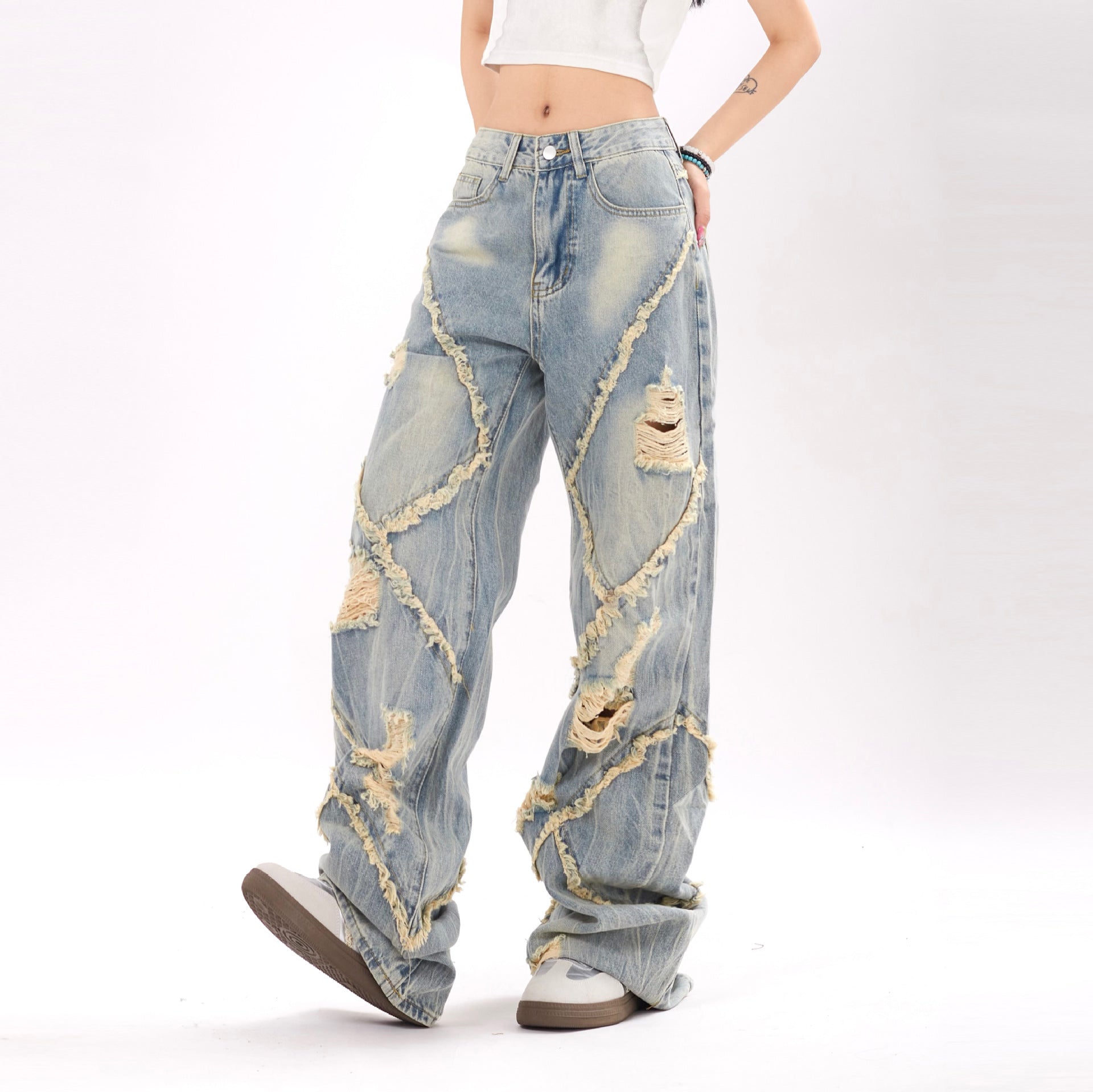 Ripped and frayed denim jeans