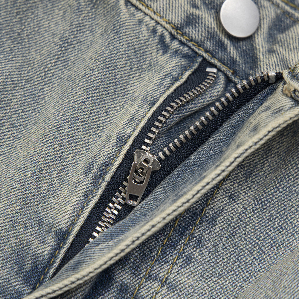 Ripped and frayed denim jeans